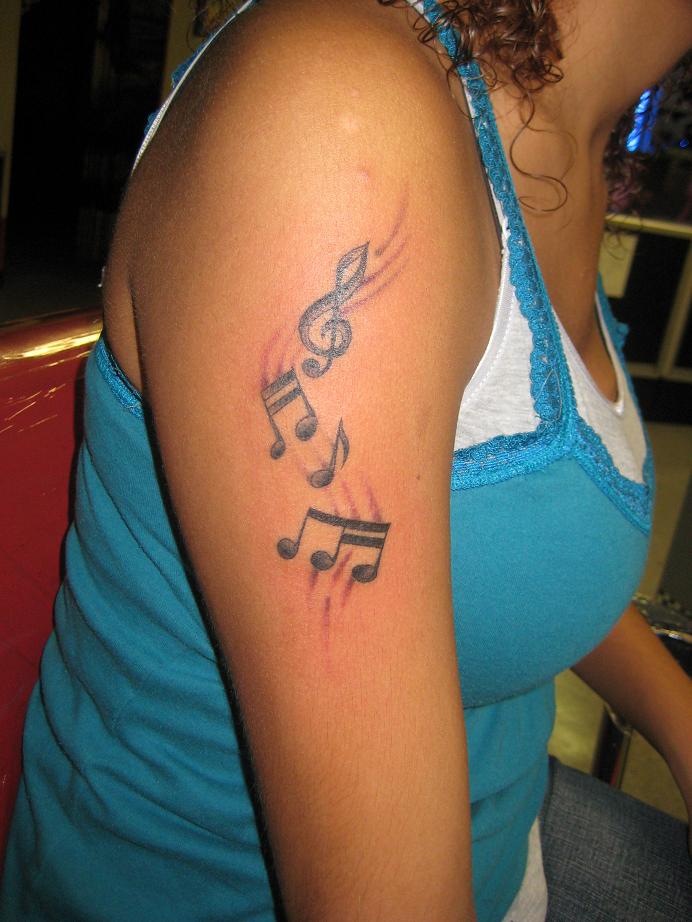Beautiful Arm music tattoo for women Free Music Tattoo Design