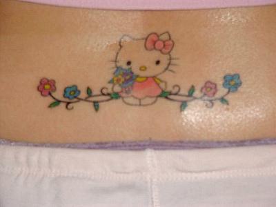 This cute lower back tattoo is