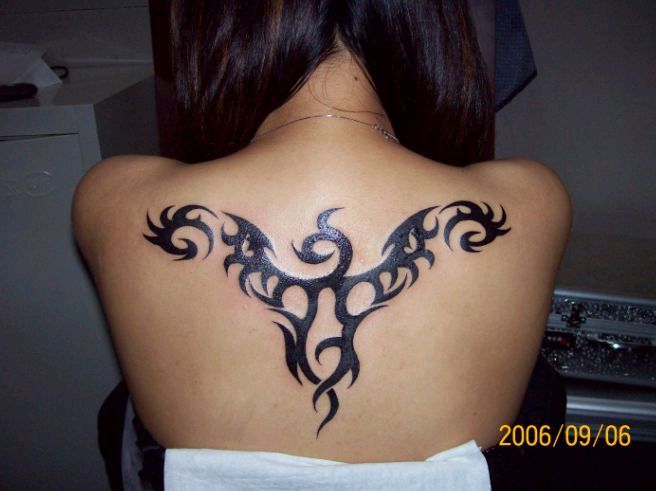 upper back star tattoos 