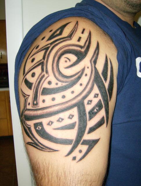 A tribal tattoo is quite an extreme tattoo it is a black design that is 