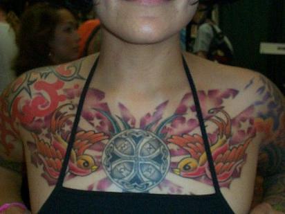 Birds cross and stars chest tattoo for women