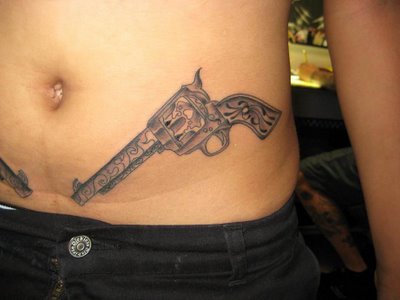 tattoos for women on hip and back on Gun Hip Tattoos | tattoo art gallery