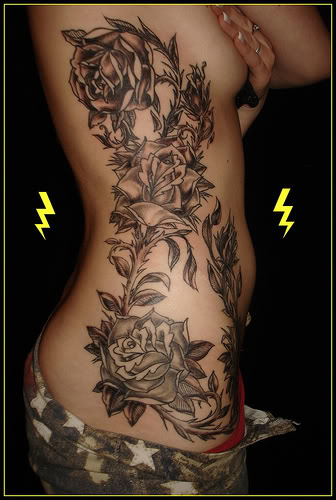 Large roses and vine extending to hip and chest